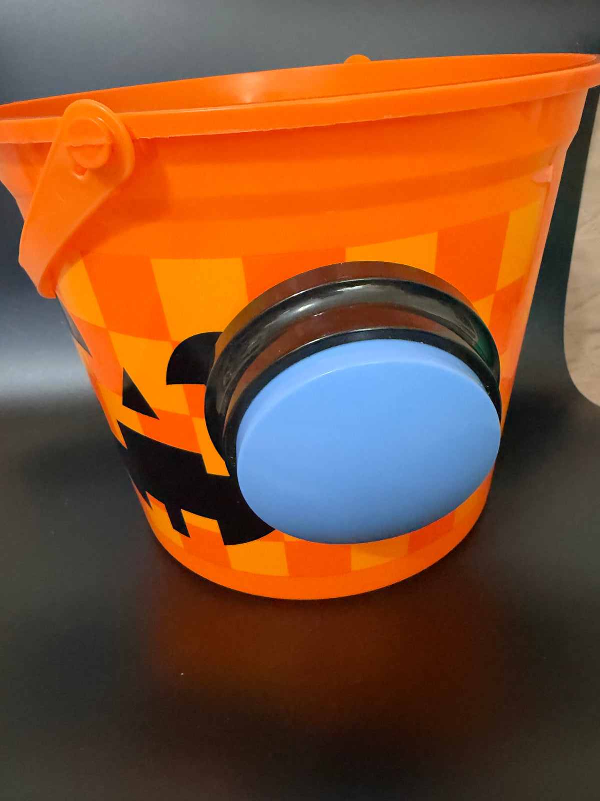 Trick or treat bucket with push button voice recorder
