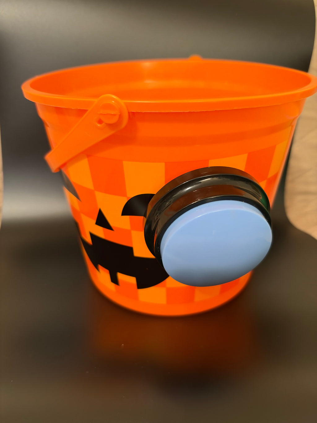 Trick or treat bucket with push button voice recorder