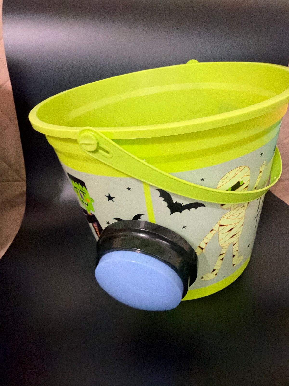 Trick or treat bucket with push button voice recorder