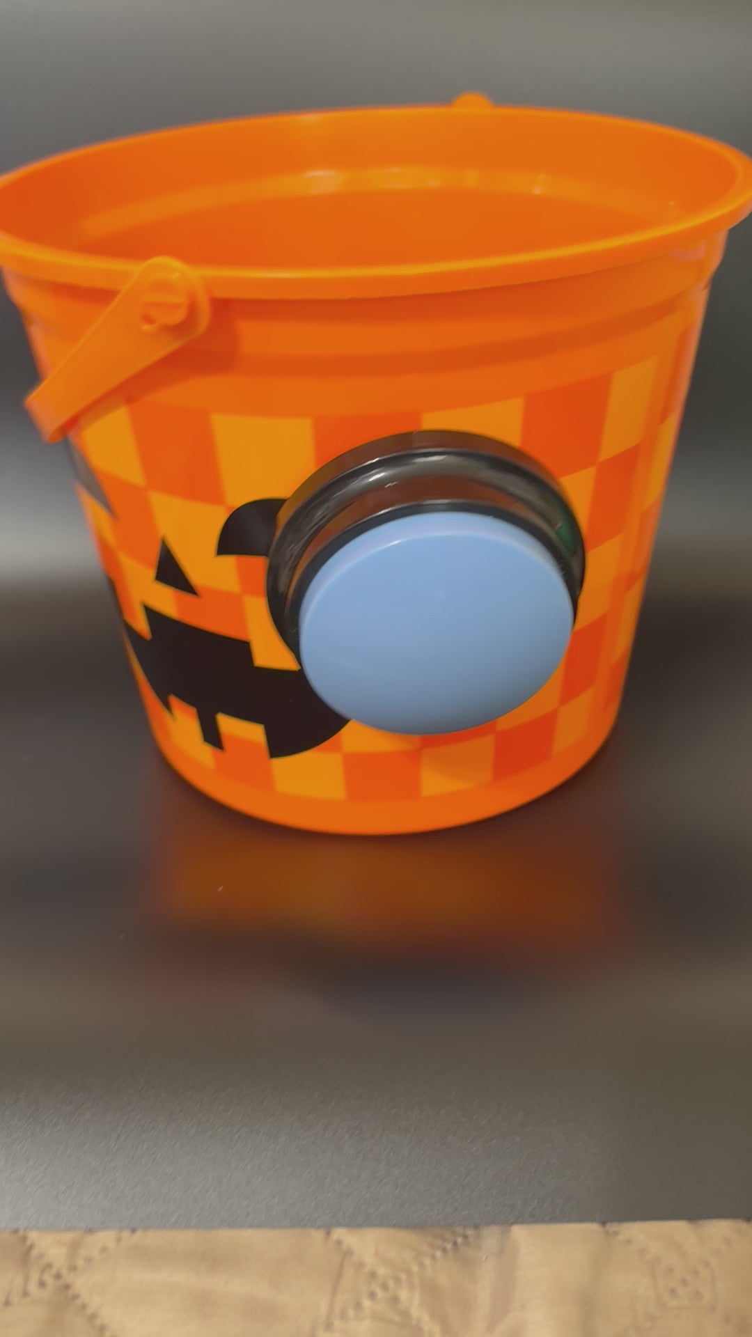 Trick or treat bucket with push button voice recorder