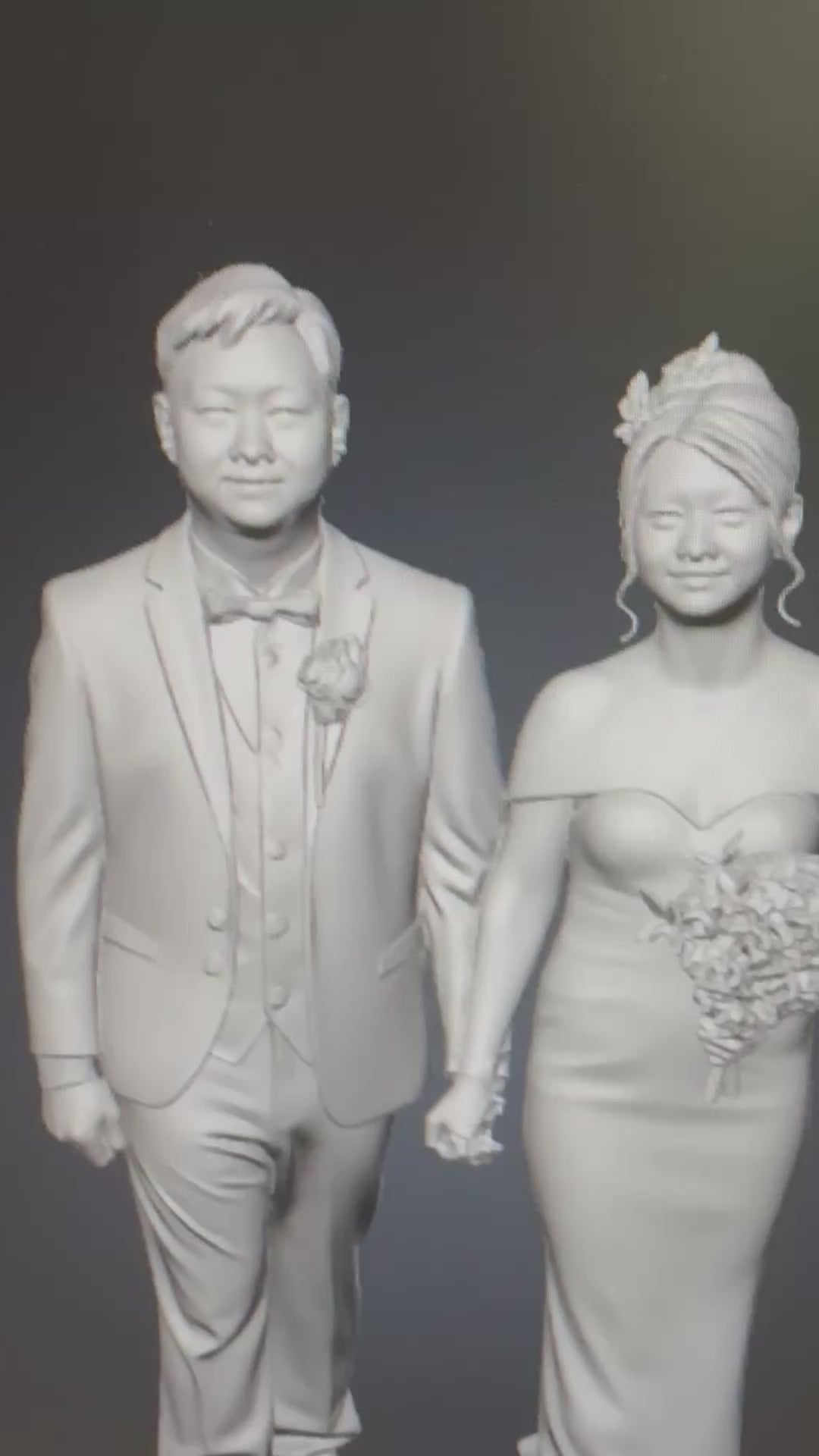 video Gray-scale 3D rendering of a couple in formal attire against a black background